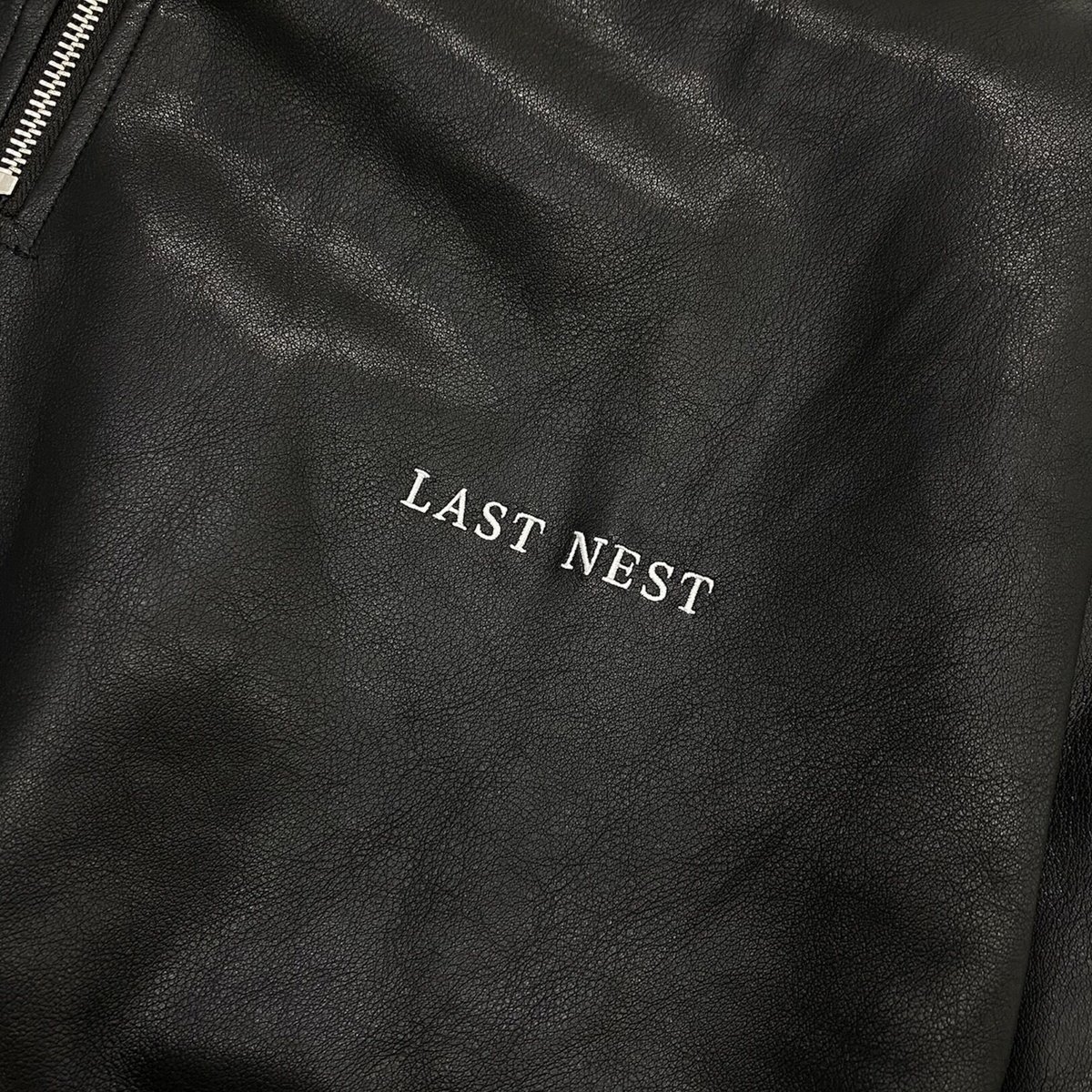 LAST NEST / leather half zip jacket