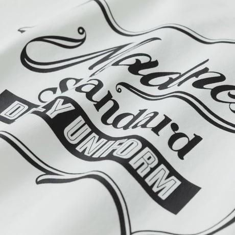 MADNESS BADGE(L) UNIFORM T-SHIRT