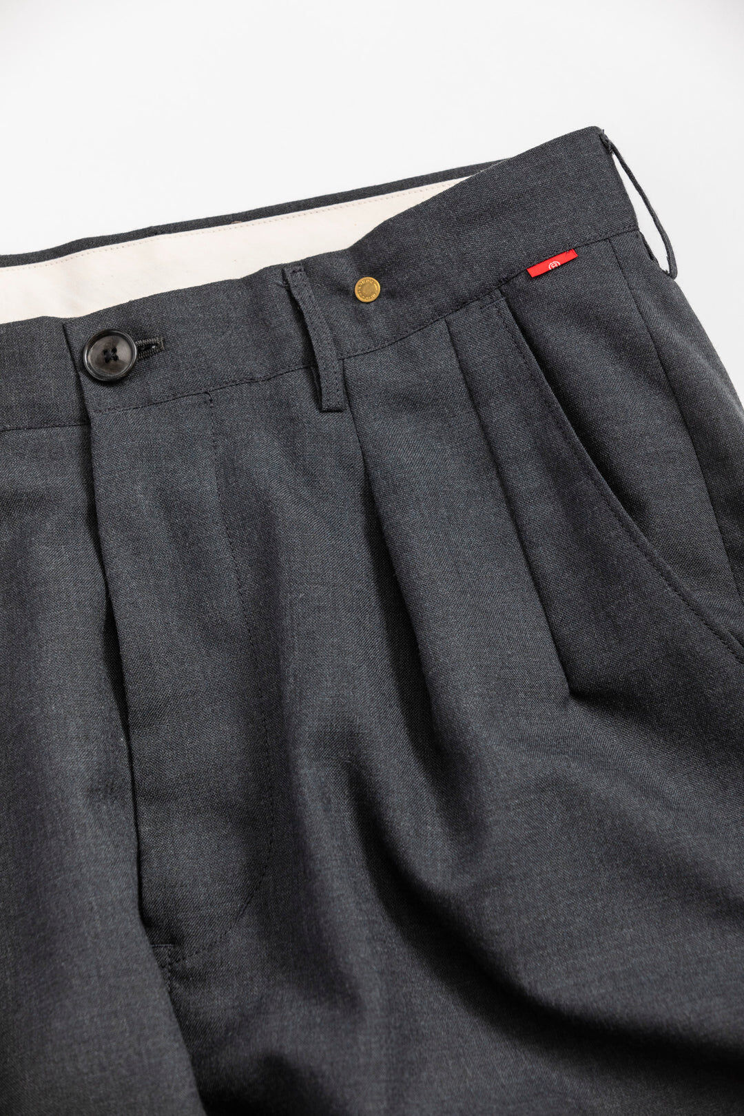 ANACHRONORM SUMMER WOOL TAPERED TROUSERS CHARCO...