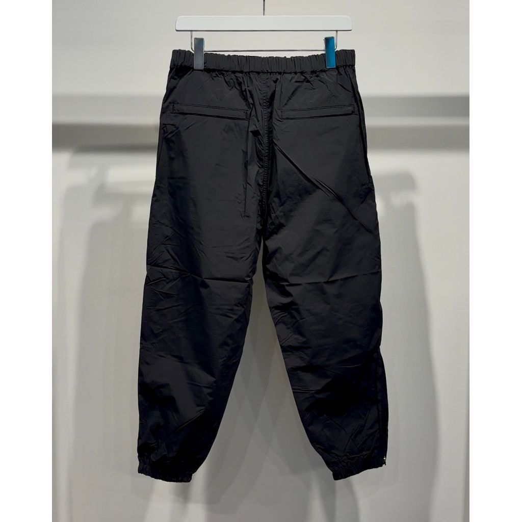 25ss ギャルソン オム ロゴ ナイロン タイプライター パンツ L COMME des GARCONS HOMME - コムデギャルソンオム25SS ロゴ入り