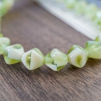 cb72◆約50個◆チェコビーズ6mm　クリームグリーンのソロバンビーズ
