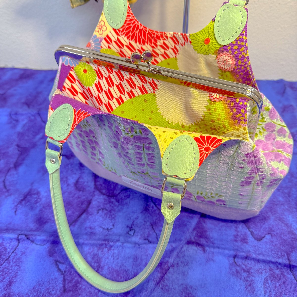 祝福(ミント)あおりがま口バッグ | Zeppink