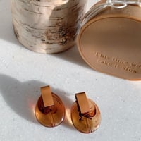 leather × marble pierce