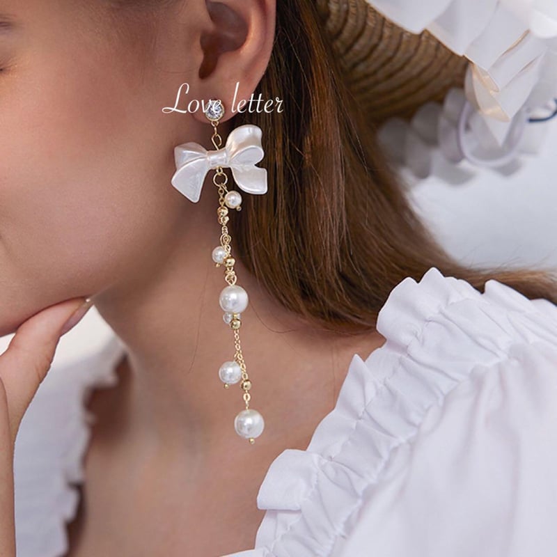 量産型ホワイトリボンパールビジューピアス イヤリング | Love