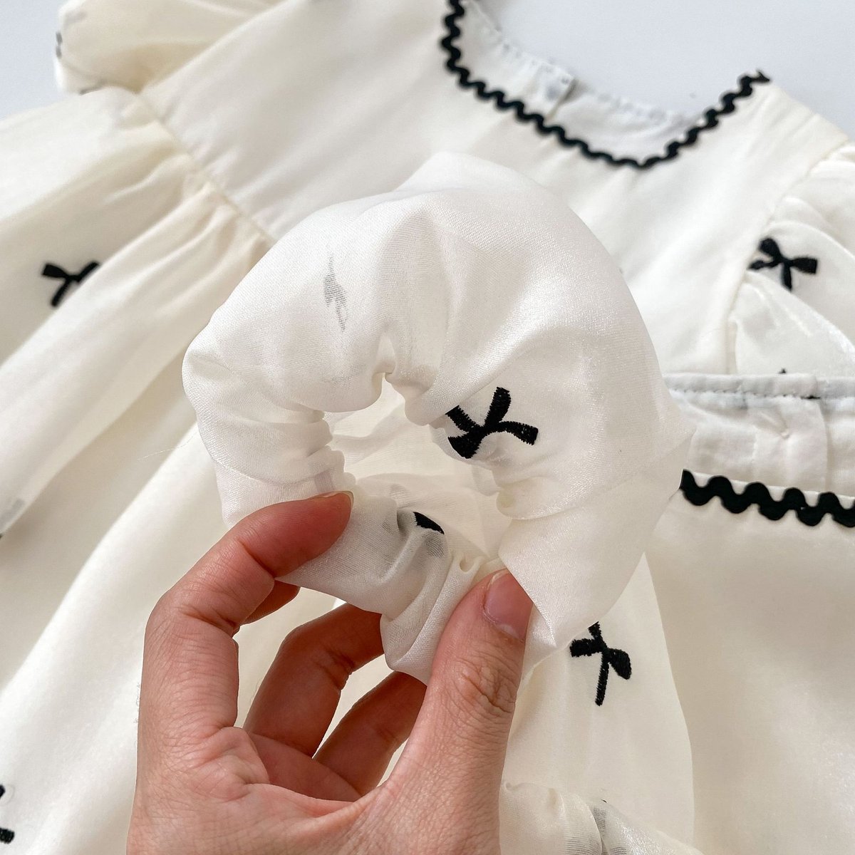 ★完売品★ 【BABY】リボン柄ロンパース 予約商品/66㎝-90㎝>リボン柄ロンパース | SQUSQU
