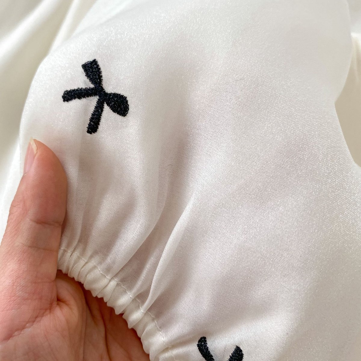 予約商品/66㎝-90㎝>リボン柄ロンパース | SQUSQU