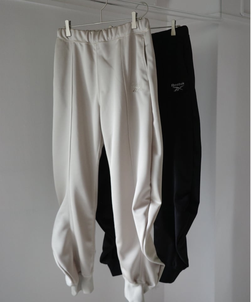 naokitomizuka / Reebok deformed sweatpants | JURK