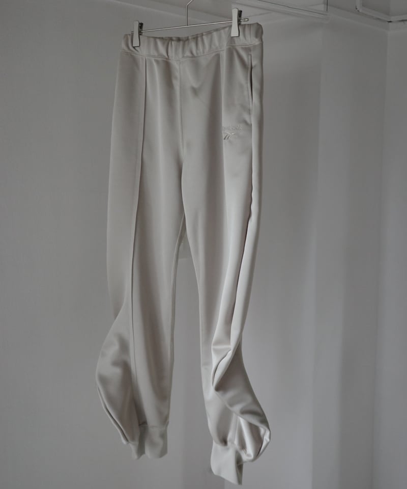 naokitomizuka / Reebok deformed sweatpants | JURK