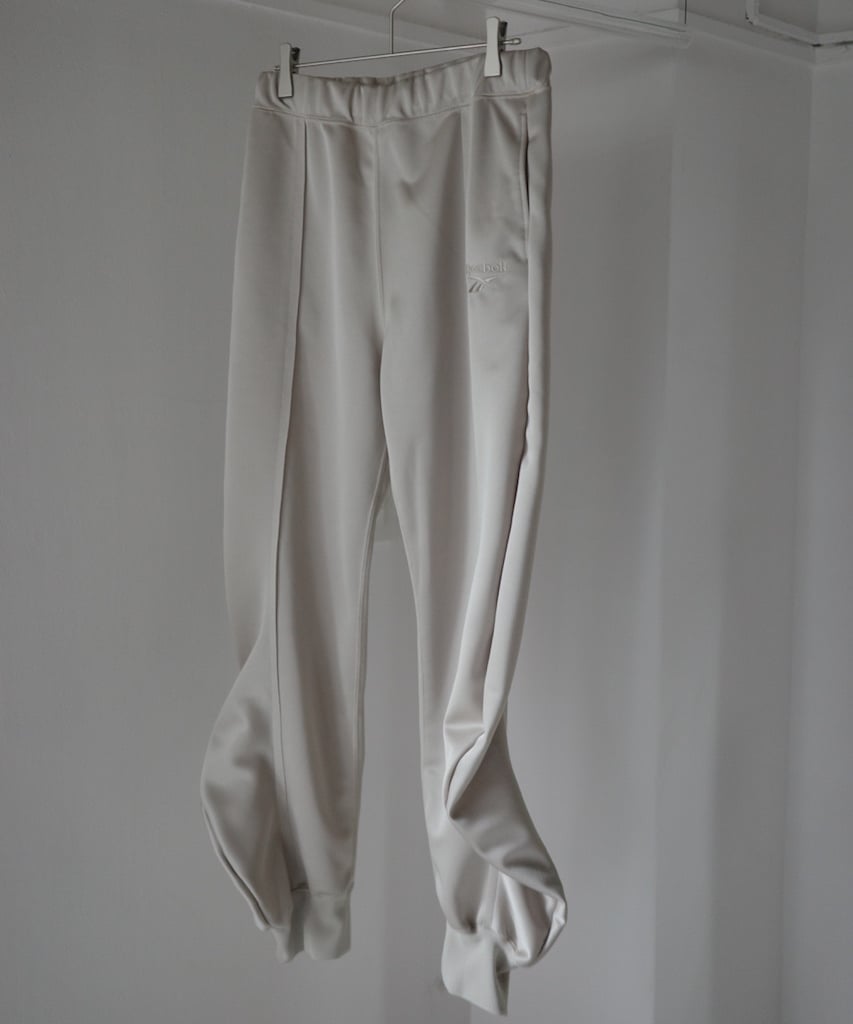 naokitomizuka / Reebok deformed sweatpants | JURK