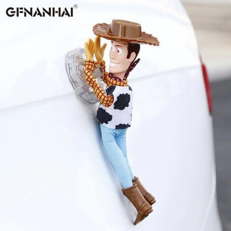 トイストーリー toy story ウッディ 車ぶら下がり しがみつき