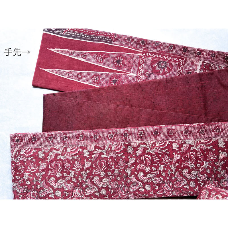 スマトラ島渡り印度更紗 九寸名古屋帯 草花文様 赤紅色B（仕立て上り