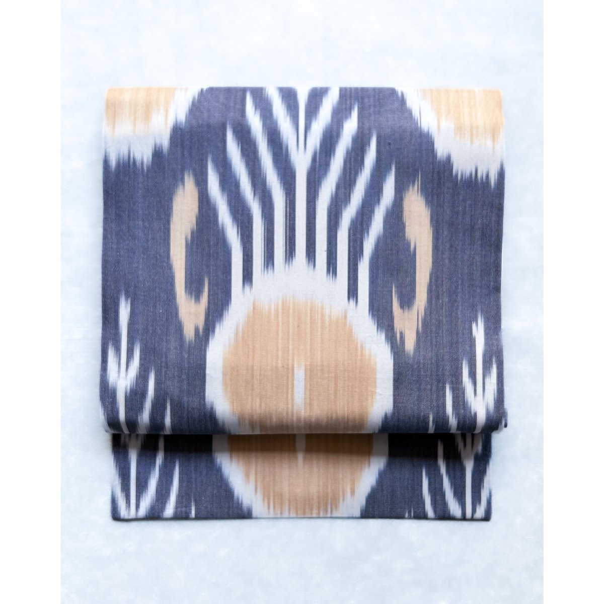 ウズベキスタン絣 木綿九寸名古屋帯 紅掛花色×花葉色（仕立て上り