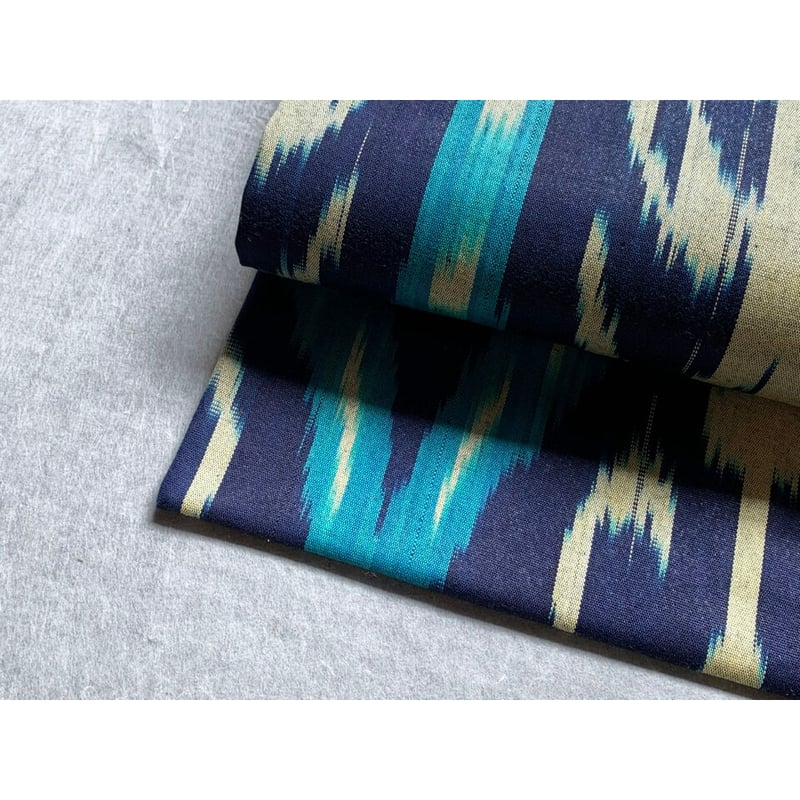 ウズベキスタン絣 木綿九寸名古屋帯 鉄紺色×ターコイズブルー（仕立て