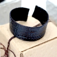 JOMON BANGLE b