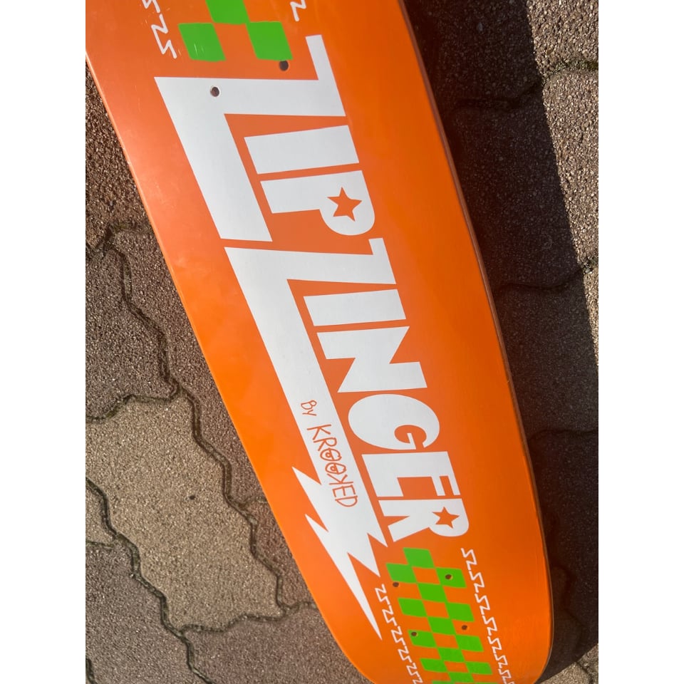 ZIP ZINGER by KROOKED ジップジンガー KROOKED ZIP ZINGER DECK ORANGE (7.75 x 30inch)