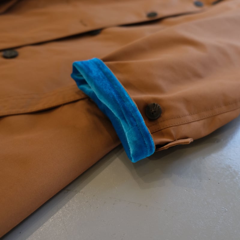 THOMAS MAGPIE back line coat BROWN×TURQUOIS