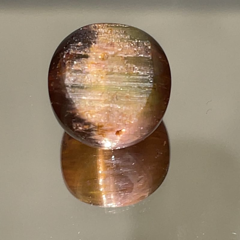 ブラジル産バイカラートルマリンキャッツアイ 33.802ct | EMERIA