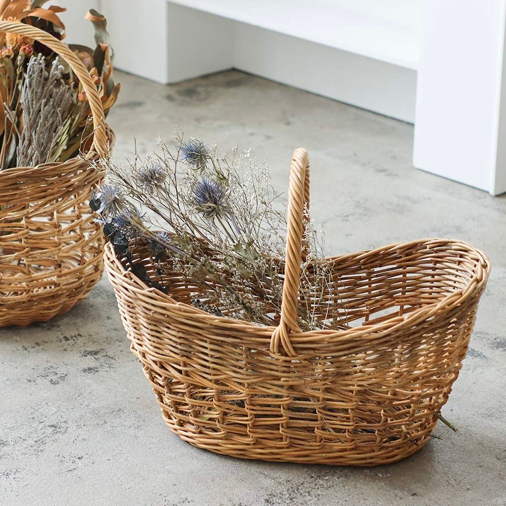 RATTAN RETRO OVAL BASKET / 天然素材の皮付きラタンを贅沢に使用したオ