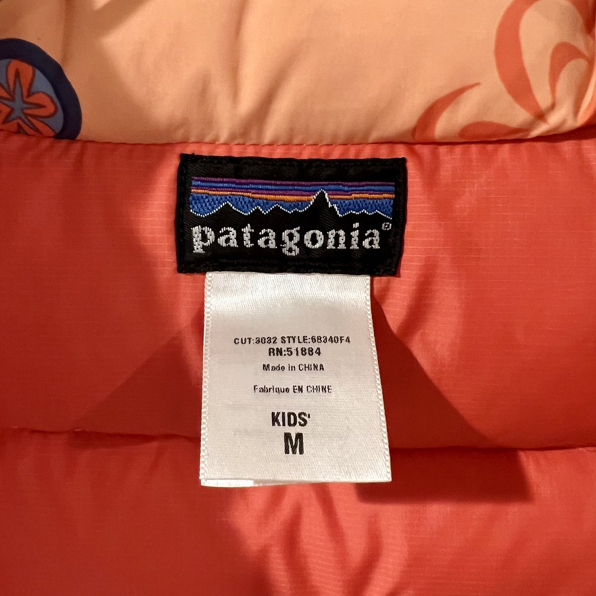 Patagonia ナイロンベスト パタゴニア 総柄 オレンジ KIDS M Patagonia ナイロンベスト パタゴニア 総柄 オレンジ KIDS M