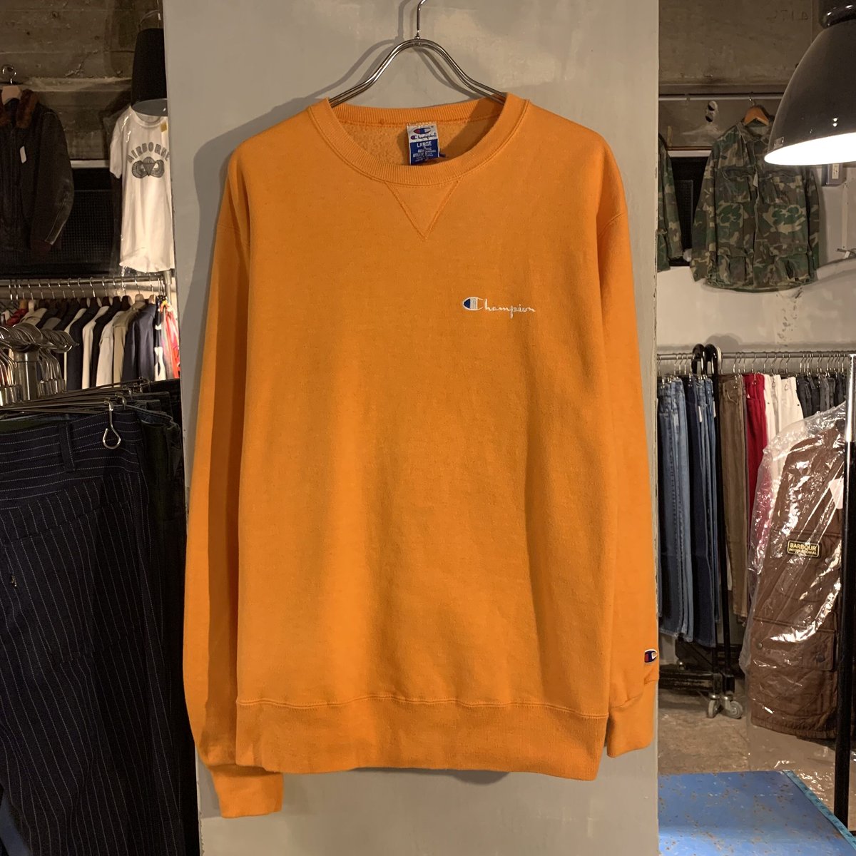ビンテージChampion テニスロゴ スウェット M オレンジ 中古・古着通販】Champion (チャンピオン) スウェット REVERSE