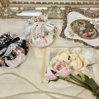 Marshmallow floral lace pouch