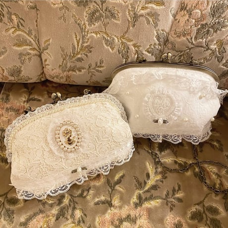 Lace cameo clasp bag