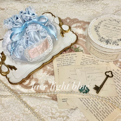 Marshmallow lace pouch