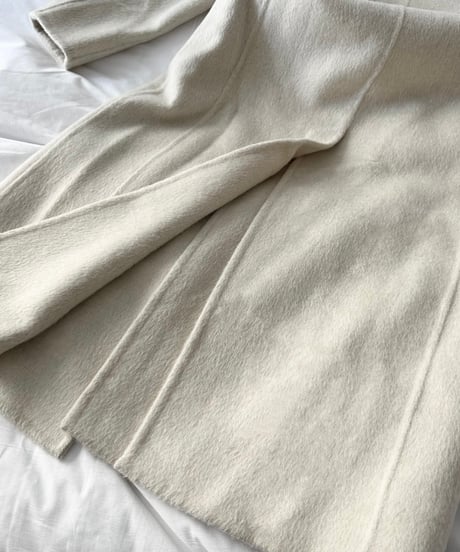 white chester coat with scarf
