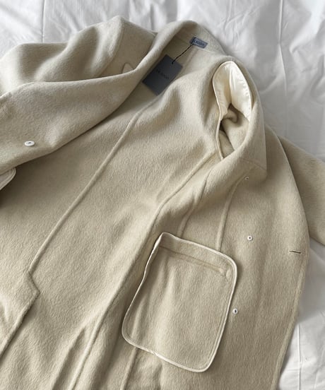 white chester coat with scarf