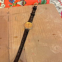 SEIKOのクォーツ黒ベルト丸盤