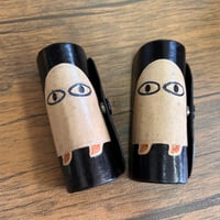 メジェド神のリップケース