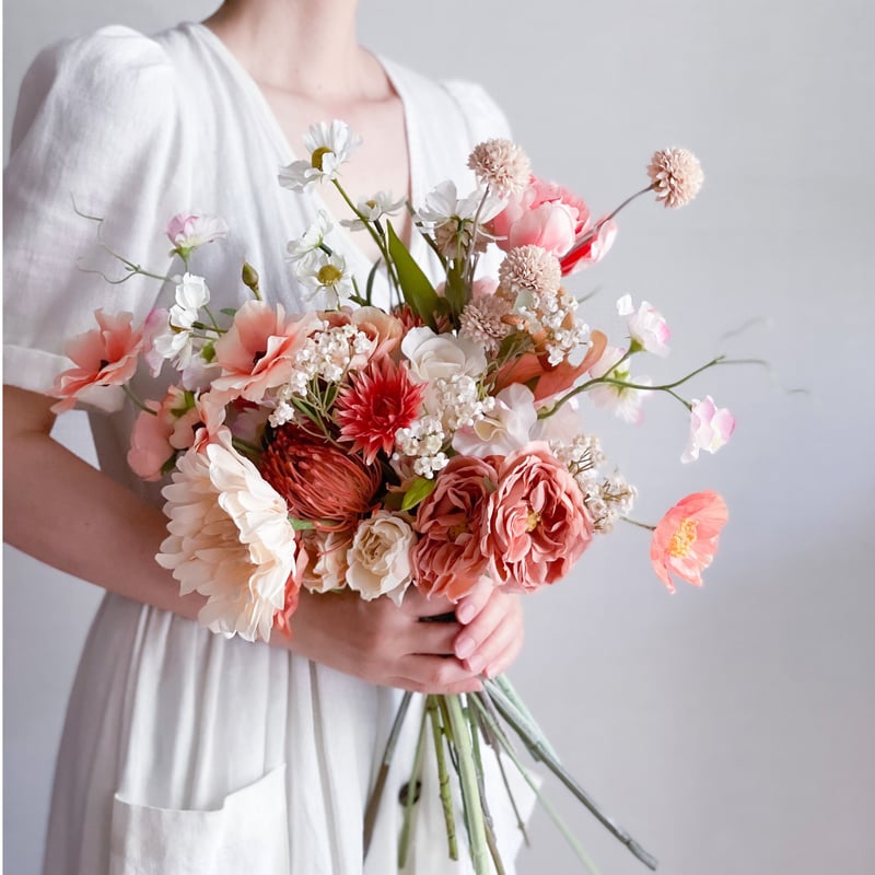 コーラルカラーのミディアムブーケ | atelier noix
