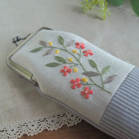 がま口ペンケース（オレンジの花）