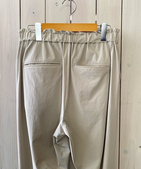 パンツ LeMelange  ルメランジュ ナイロン4WAYストレッチテーパードパンツ グレーベージュ 8623506