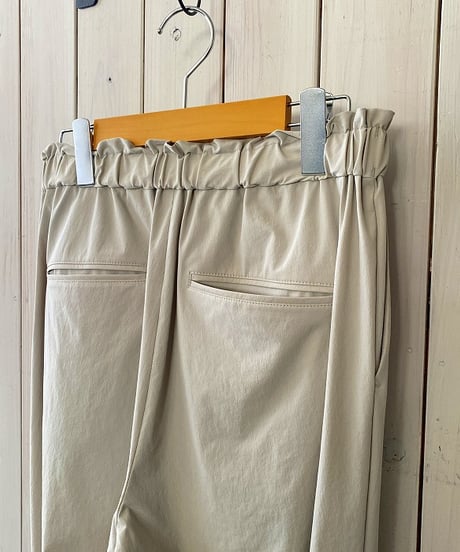 パンツ LeMelange  ルメランジュ ナイロン4WAYストレッチテーパードパンツ グレーベージュ 8623506