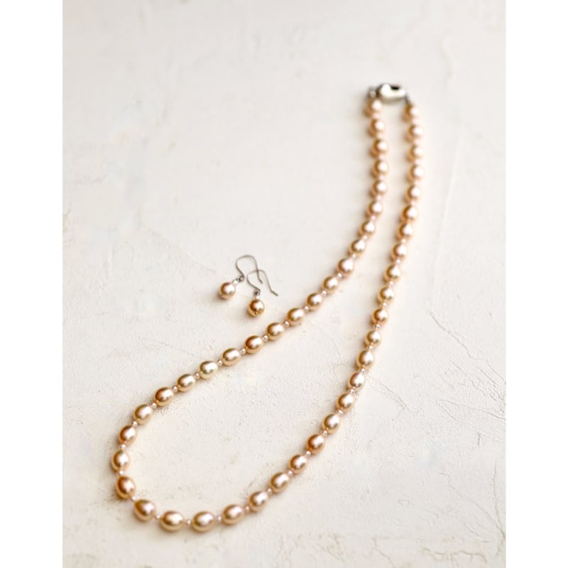 オレンジピンクの淡水パールネックレス（ピアス付き） | izumi