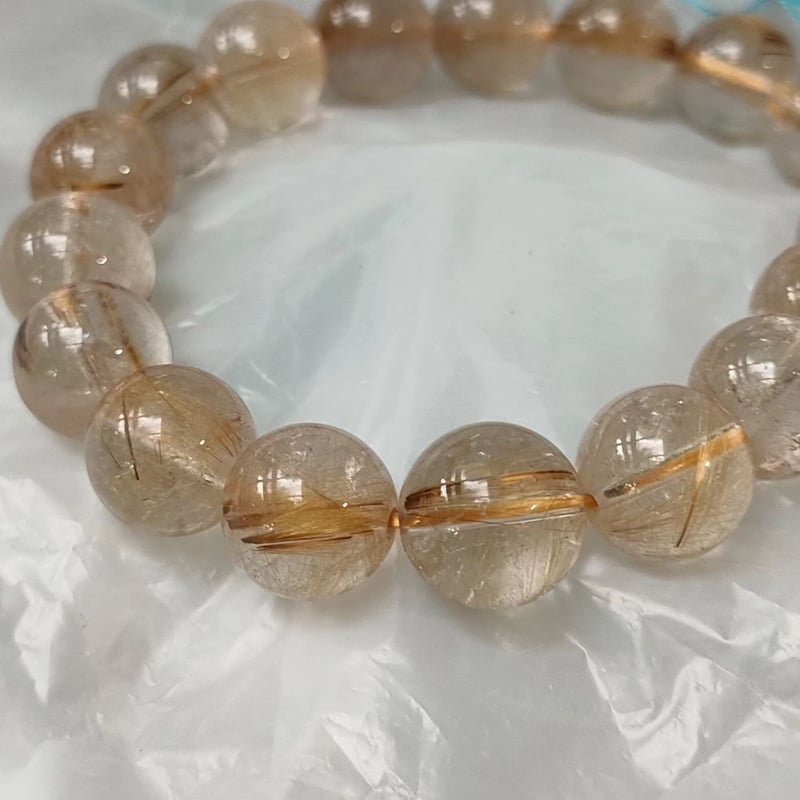 ◇渋く輝くブラウンゴールドのルチル◇存在感のある11.5mm珠 