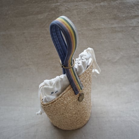 Raffia basket one handle bag with antique linen