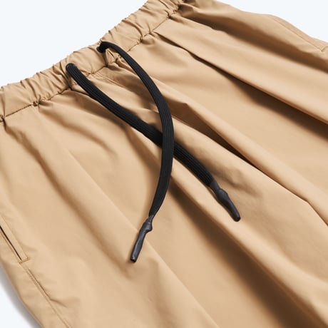 WATER REPELLENT TAPERED STRETCH TRACK PANTS (BEIGE)