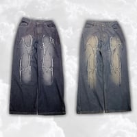 トライバルダメージワイドデニム
