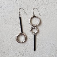 silver ring asymmetry