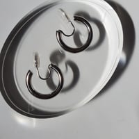 Silver hoop earring