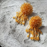 yellow beads pierce
