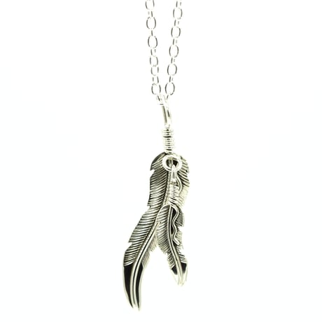 北米のインディアンジュエリーと装飾品 写真集 Indian Jewelry ターコイズ付き大フェザー左（シルバー） #レッドマン