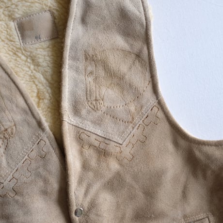 Suede boa vest