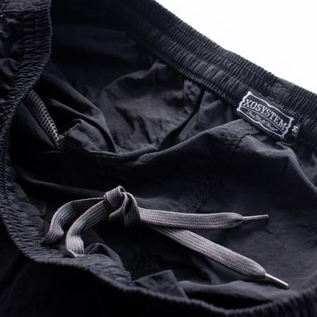 XOSYSTEM｜XO ARCH LOGO NYLON PANTS