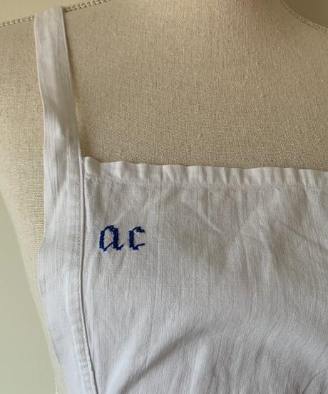 Initial embroidered apron