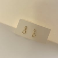 "firm" earrings