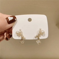 Diagonal pearl ピアス