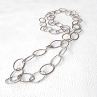 old silver necklace”